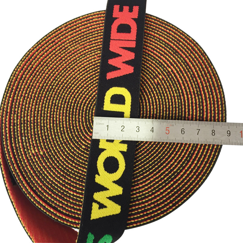 Bande élastique en fibre de nylon souple de 3 cm avec logo jacquard en vert, jaune et rouge